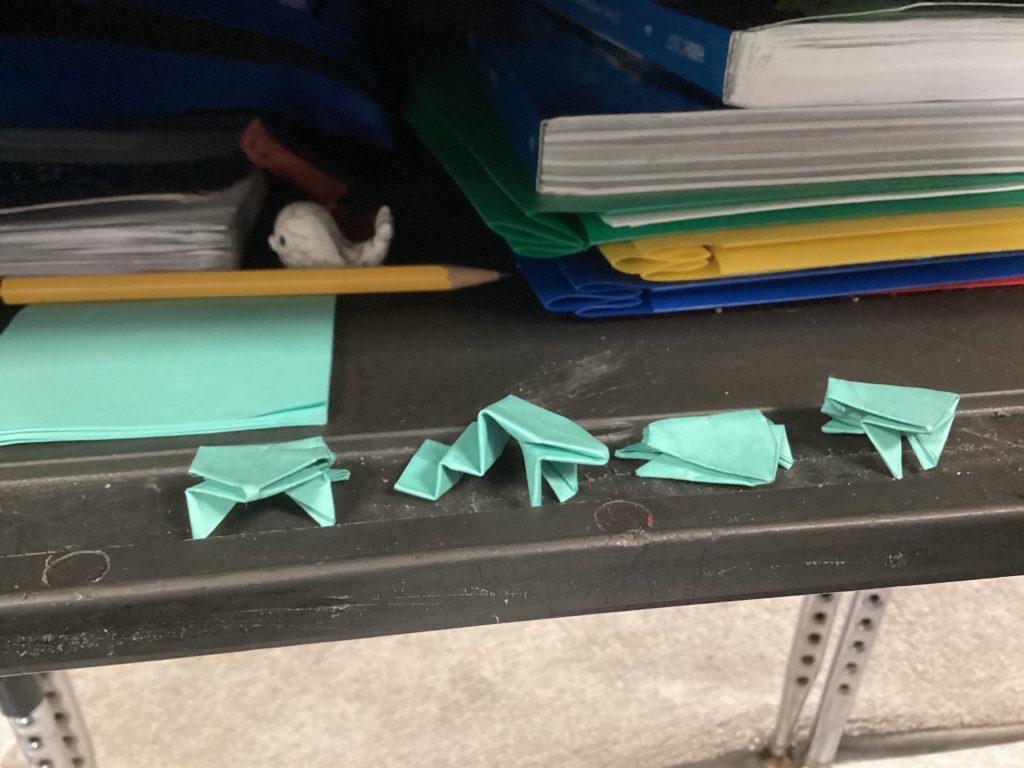 four origami frogs
