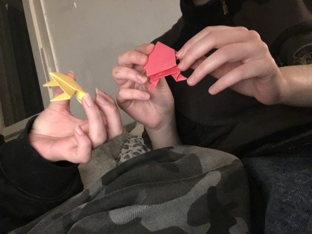 two origami jumping frogs
